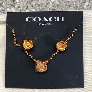 Coach rose gold stud earring and necklace set